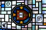 Detail, Cathedral’s Coat of Arms: Gospel and Sword with Vignettes of Beaver, Maple Leaf, and Trillium Flower from the Dean’s office windows of Cathedral’s Heraldic Arms and Vignette of Current Cathedral by Christopher Wallis