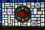 Coat of Arms of the Dean, Sign of St. Aidan, Crossed Swords from the Dean’s office windows of Vignette of Old St. Paul’s (burned) and the Dean of the Cathedral by Christopher Wallis