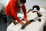 Draping patient for neuro exam (supine). by Clinical Neurological Sciences, Schulich School of Medicine and Dentistry
