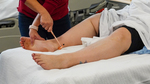 Deep tendon reflex testing: ankle jerk (supine)