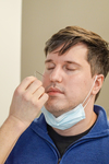 Testing sensation on face to pin  (CN V maxillary division V2)