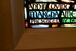 Detail, Signature from Martha Amelia Stiles Memorial Window or St. Francis of Assisi Tending to the Poor by Yvonne Williams