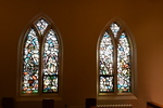 View of Chapel Windows on South Wall Depicting Care and Compassion for the Poor or the James and Mary Brydson Memorial Window and the Albert and Julia Moffitt Memorial Window by Yvonne Williams